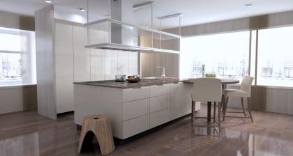 A modern kitchen featuring a spacious island and a sleek bar area.